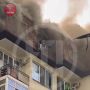 Спасаясь от пожара, женщина в Сочи вылезла на кондиционер за окном на высоте шестого этажа